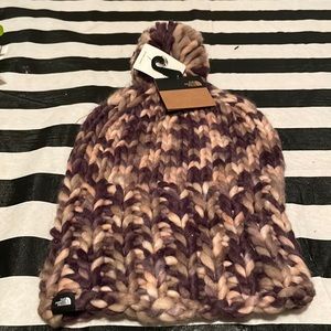 Two brand new the North Face hand knit one size fits all hats.